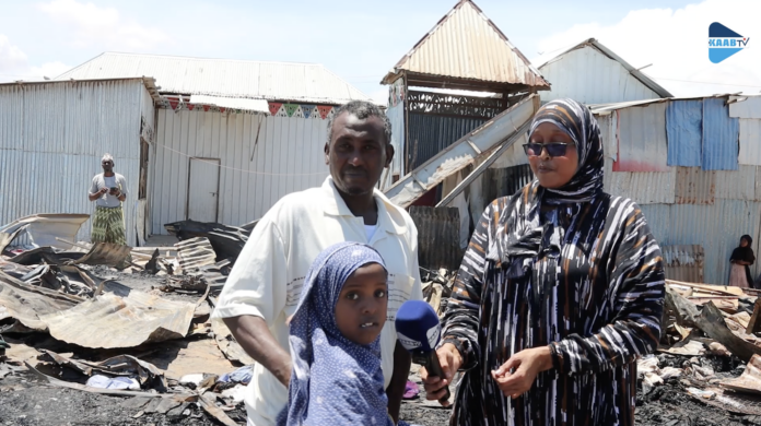 Poor families and their children are now facing despair ahead of the Eid al-Fitr celebration later this week after a massive fire destroyed their houses in the Kaxda district of Mogadishu on Saturday. | PHOTO/ Kaab TV.